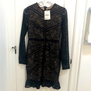 Brand new (with tags) lace overlay minidress.
